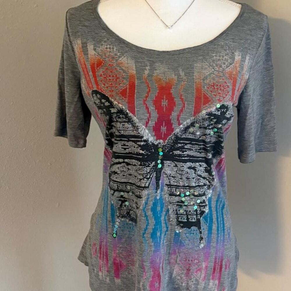 y2k butterfly graphic tee with sequins and colorful abstract background